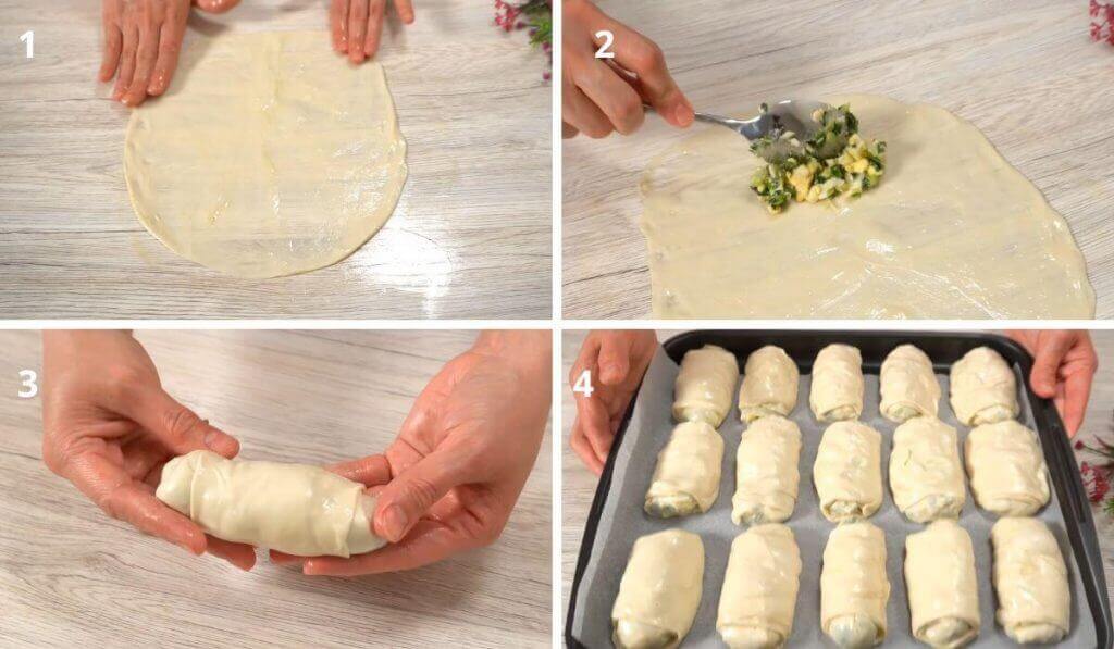 Panes rellenos en proceso de ser formados y colocados en una bandeja para hornear.